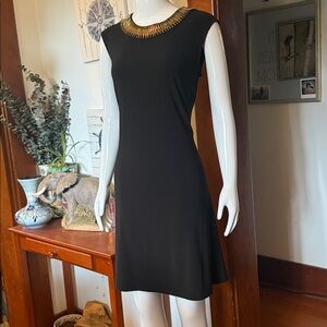 Db established 1962 size large Stylish Black Sleeveless Dress with Gold Accent